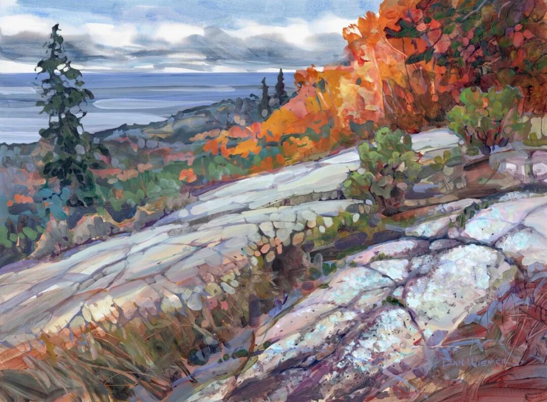 Vibrant fall foliage by the coastline.