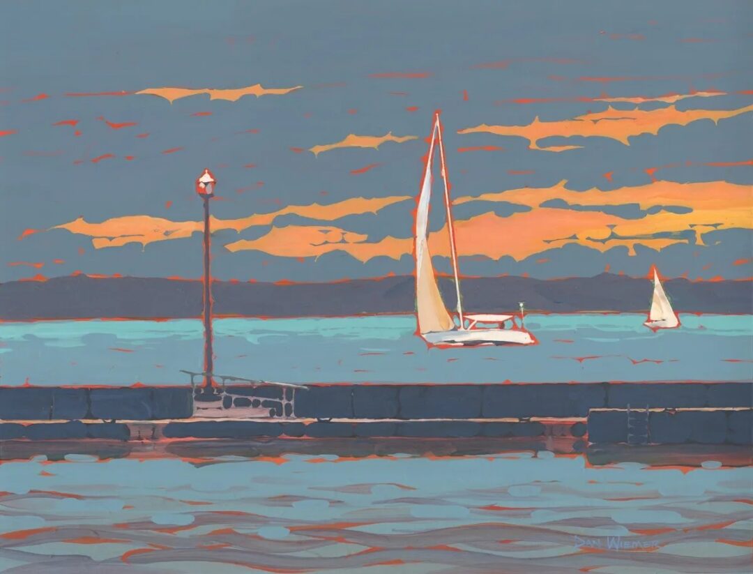 Sailboats on a colorful sunset sea