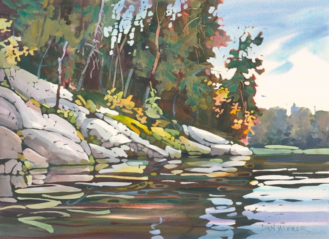 Vibrant autumn foliage by the water
