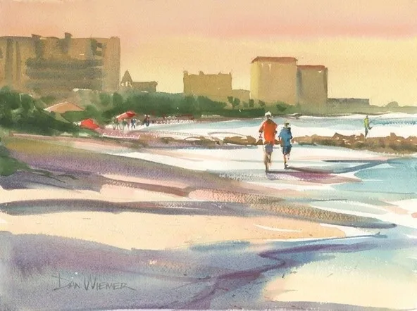 Coastal landscape with people and umbrellas