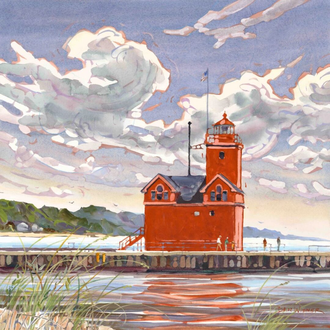 Red lighthouse under cloudy sky